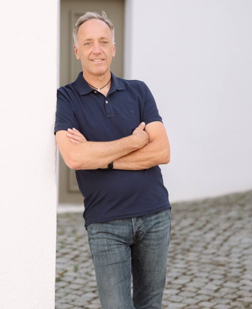 Portrait of Michael Hertle, life coach and former airline captain, sharing his personal journey from aviation leadership to professional coaching.